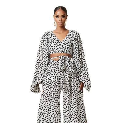 China Fashion Women Breathable Leopard Print African Lace Up Loose Top Breathable Tender Lantern Sleeve Leg Pants Wide Leg Set for sale