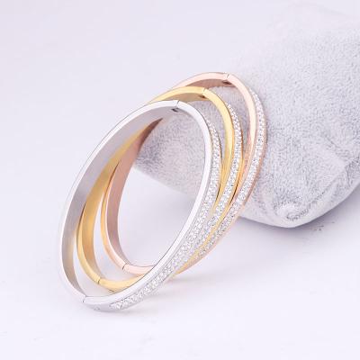 China Wholesale new version ladies steel double rows of diamonds pave stainless steel bangle snap buckle bracelets for sale