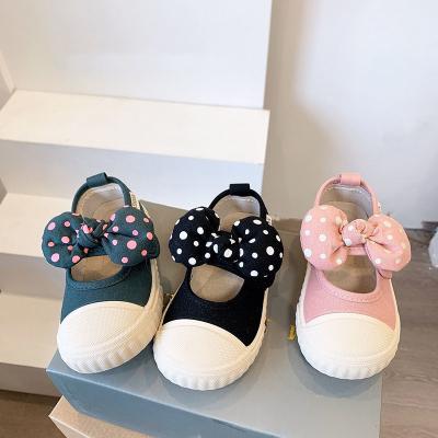 China New Arrival Rubber Kids Bow Canvas Shoes Girls Soft Sole Buckle School Indoor Shoes for sale