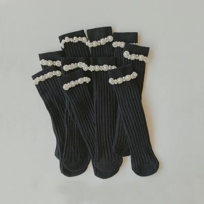 China Latest Design Sustainable Boutique Girls Handmade Bead Decorate Kids Black Socks for sale