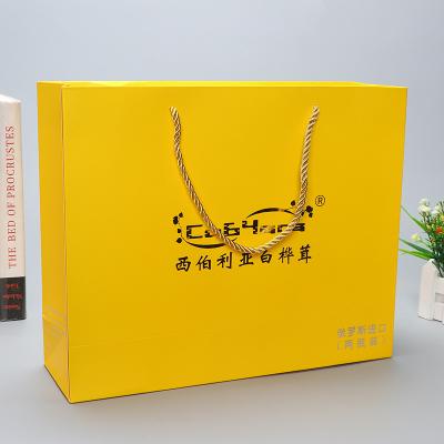 China Recycled Materials Wholesale Custom Printed Gift Luxury Shopping Paper Bag With Handle for sale