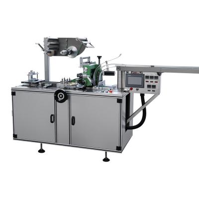 China Food Cellophane Wrapping Machine for Hair Care Products, Oil, and Tea Box for sale