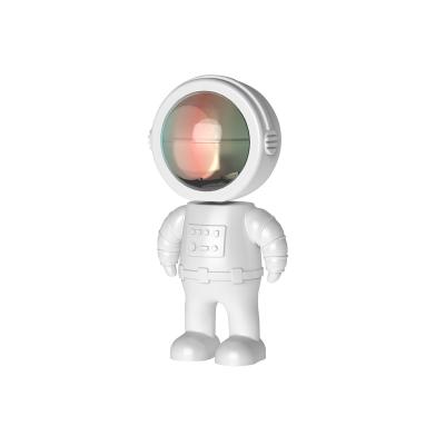 China Cute Astronaut Sunset Projector Rainbow Atmosphere Bedroom Cafe Background Wall Decoration Usb Night Lamp For Home for sale