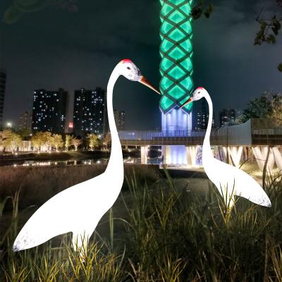 China Outdoor Garden Decotation Landscape Garden Resort Pool Decoration Fiberglass Reinforced Resin Crafts Animal Birds Led Crane for sale