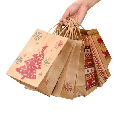 China Promotional Gifts Christmas Handle Bag Environmental Protection Recyclable Paper Material Christmas Gift Bag for sale