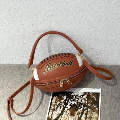 China Fashion JANHE unique hombros bolso oval shape women PU leather top handle soccer bags football handbag rugby ball purse with chain for sale