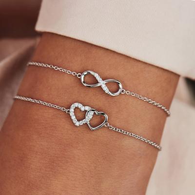 China 18k Silver Adjustable Plated Infinito Jewelry 925 Sterling Silver Infinity Bracelet Women With 2 Hearts for sale