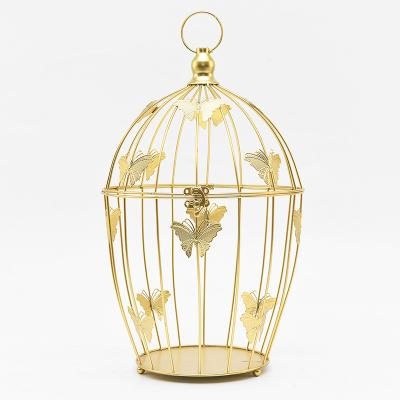 China Home Decoration New Arrival Gold Wire Lantern With Butterfly Candle Holders Nordic Metal Tall Candle Holders For Wedding Decoration for sale