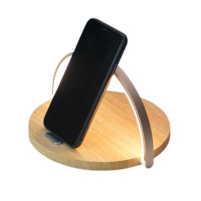 China Flexible The Latest Fashion Small Night Light Phone Holder Wireless Charger Desk Lamp With Phone Holder Desk Lamp Wooden Night Light for sale