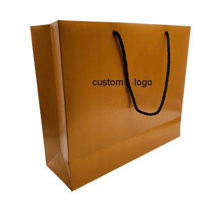 China Recycled Materials Factory Logo Custom Shopping Paper Bags for sale