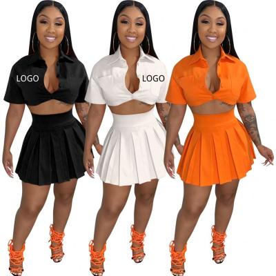 China Spandex/Polyester 2023 Short Sleeve Solid Pleated Skirts And Button Crop Top Two Piece Set Women Golf Set Summer Sport Tennis Skirt Set for sale