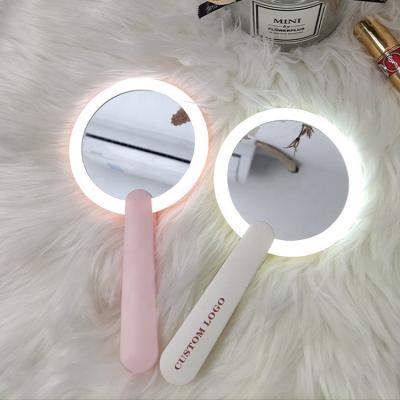 China Logo Mirror Portable Customized Lit 360 Degree Rotation Handheld Makeup Mirror Rechargeable Battery for sale