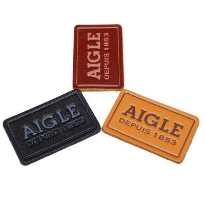 China Free Sample New Design Custom Logo Low Price Professional Fashion 3D Embroidery Leather Embossed Patches for sale