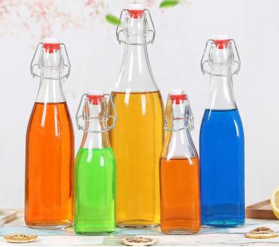 China Minimalist Swing Top Bottles With Airtight Lids For Oil Vinegar Beverage Liquor Beer Water Soda 250/500/750/1000ml for sale