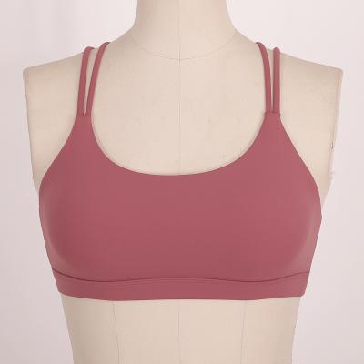 China Breathable Cross Splice Women's Yoga Bra Top Sports Fitness Gathered Shockproof Bra for sale