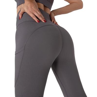 China Antibacterial High Waist Women Yoga Pants Tight Woman Jogging Pants Yoga Pants With Pocket Butt Lift Yoga Gaiters for sale