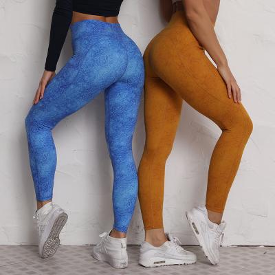 China Antibacterial Custom Logo Womens Yoga Pants Nylon Spandex Printed Naked Feeling Yoga Pants With Phone Pockets for sale