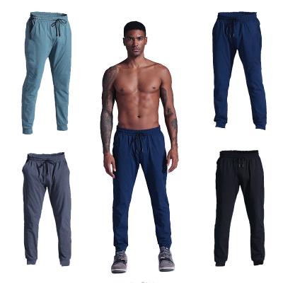 China Wholesale Custom Plain QUICK DRY Breathable Sportswear Pants Fit Men's Gym Pants Boy's Jogger With Pockets for sale