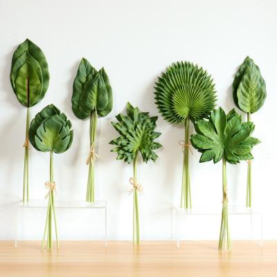 China PU Artificial Flower High Simulation New Items Leaves Falsee Leaves Binds Small Monstera Leaf Decorative Bouquet Monstera Artificial Plant for sale