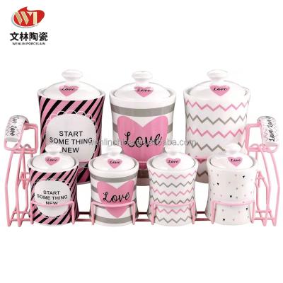 China Sustainable Unique Design Kitchen Used 7 Pcs Porcelain Spice Jar Salt Condiment Canister Set Seasonings Sugar Jar With Metal Rack for sale