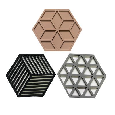 China Hexagon Silicone Table Mat Viable Heat Resistant Silicone Hollow Mat for sale