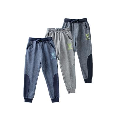 China Children's pants generally 2021 spring and middle of the autumn Korean-style new boys' pants and big children's sports knitted stitching pants for sale