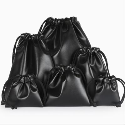 China Custom Black Shou Pouch Recyclable PU Leather Drawstring Bag PU Leather Gift Bag Black Dust Bags For Jewelry Storage for sale