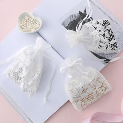 China Recyclable White Creative Pouch Jewelry Storage Pouch Small Drawstring Leaf Lace Drawstring Bag for sale