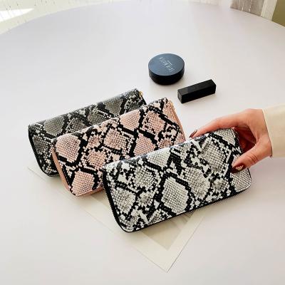 China New personality waterproof luxury women's PU wallet mobile phone change card snake pattern clutch bag for sale