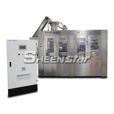 China Hot Sale 6000bph Glass Beverage Bottle Juice Filling And Seaming Machine for sale