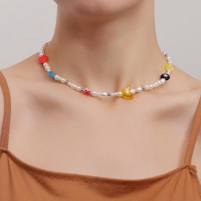 China Fashion ZUOWEN Polymer Clay Acrylic Luster Simple Bohemian Women's Choker Butterfly White Pearl Necklace for sale