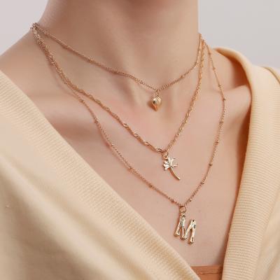 China ZUOWEN Fashion Lead Free Nickel Free Multilayer Alloy Women's Pendant Necklace Gold Plated Love Letter M Pendant Necklace for sale