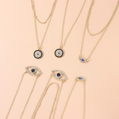 China ZUOWEN Fashion Woman Diamond Round Pendant Necklace Alloy Fashion Simple Evil Eye Religious Amulet Pendant Necklace for sale