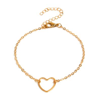 China ZUOWNE Lead Free Nickel Free Factory Directly Sell Simple Women's Alloy Bracelet Hollow Bangle Heart Shaped Jewelry for sale