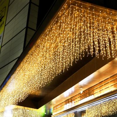 China Holiday Hot Sale Outdoor Decoration 4m 0.6m Waterproof Christmas Curtain Ice Rain Icicle Led String Lights Garden Christmas Decorative Lights for sale