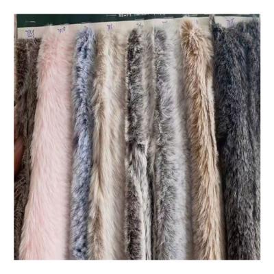 China High quality artificial fur dyeing raccoon faded wool velvet brushed flower ladies winter coat fabric for sale