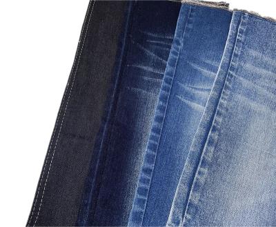 China Cheap Price Super Dark Blue Stretch TR Breathable Bouncing 8.6 Oz Denim Fabric For Jeans for sale