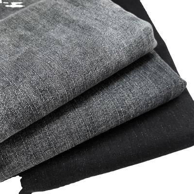 China Breathable Stock Blue Black 9.8 Oz Cotton Polyester Spandex Denim Fabric For Jeans for sale