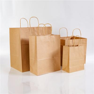 China Brown Recyclable Custom Printed Logo Cardboard Kraft Gift Craft Shopping Paper Bag for sale