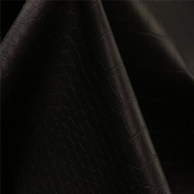 China Hot Selling Popular Waterproof PU Coated To Emboss Synthetic Leather Stretch For Garment for sale