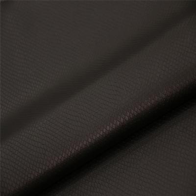 China Hot Selling Popular Waterproof PU Coated To Emboss Synthetic Leather Stretch For Garment for sale