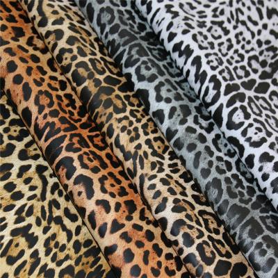 China Waterproof Hot Sale Fashion Design Animal Print Rayon Backing PU Leather For Jacket And Skirt for sale