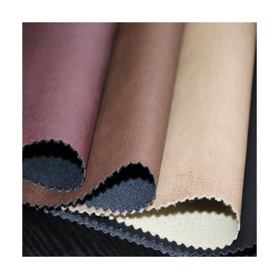 China Very popular wind proof thickness0.7MM rayon backing PU to face fabric for man's jacket or other daily ues items for sale