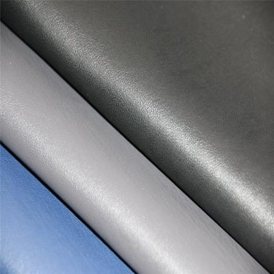 China Very popular wind proof thickness0.7MM rayon backing PU to face fabric for man's jacket or other daily ues items for sale