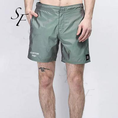 China Custom Anti-wrinkle Summer Style Men's Casual Elastic Waist Mesh Lined Reflective Board Iridescent Green Jogger Shorts for sale