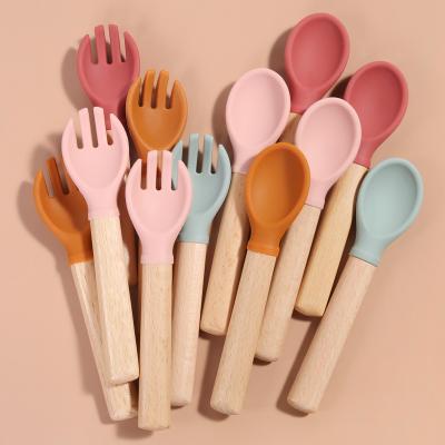 China Sustainable Hot Easy Sales Baby Spoon Soft Tip Baby Plates Fork Silicone Spoon Set for sale