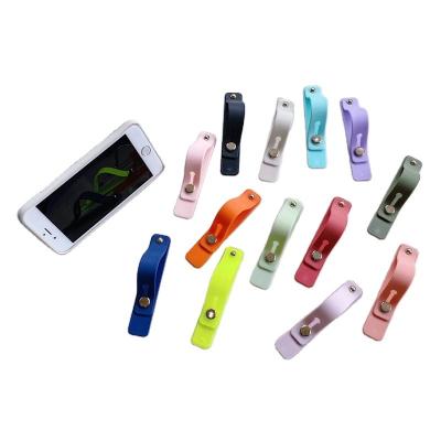 China PORTABLE Candy Color Mobile Phone Holder Universal Silicone Finger Kickstand Cell Phone Grip Holder Wristband Stand For Samsung for sale