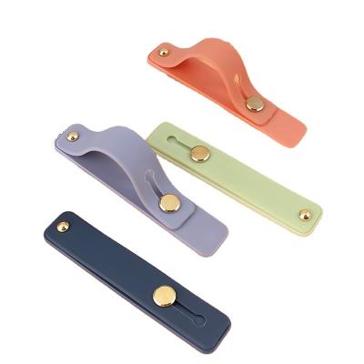 China Waterproof NEW Wrist Band Hand Band Finger Grip Mobile Phone Holder Stand Push Pull Universal Car Phone Socket Holder For iphone 11 xiao mi for sale