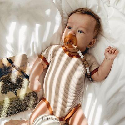 China OEM style custom wholesale ins sales new 2022 SUMMER newborn baby jumpsuit baby boy romper clothes overrun for sale