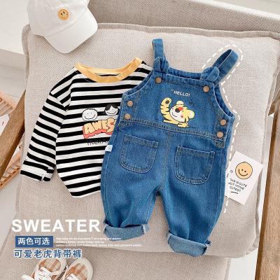 China Viable Children's Tiger Suspender Pants 0-5 Years Old Boy Alphabet Cartoon Pants Baby Boy Washed Jeans for sale